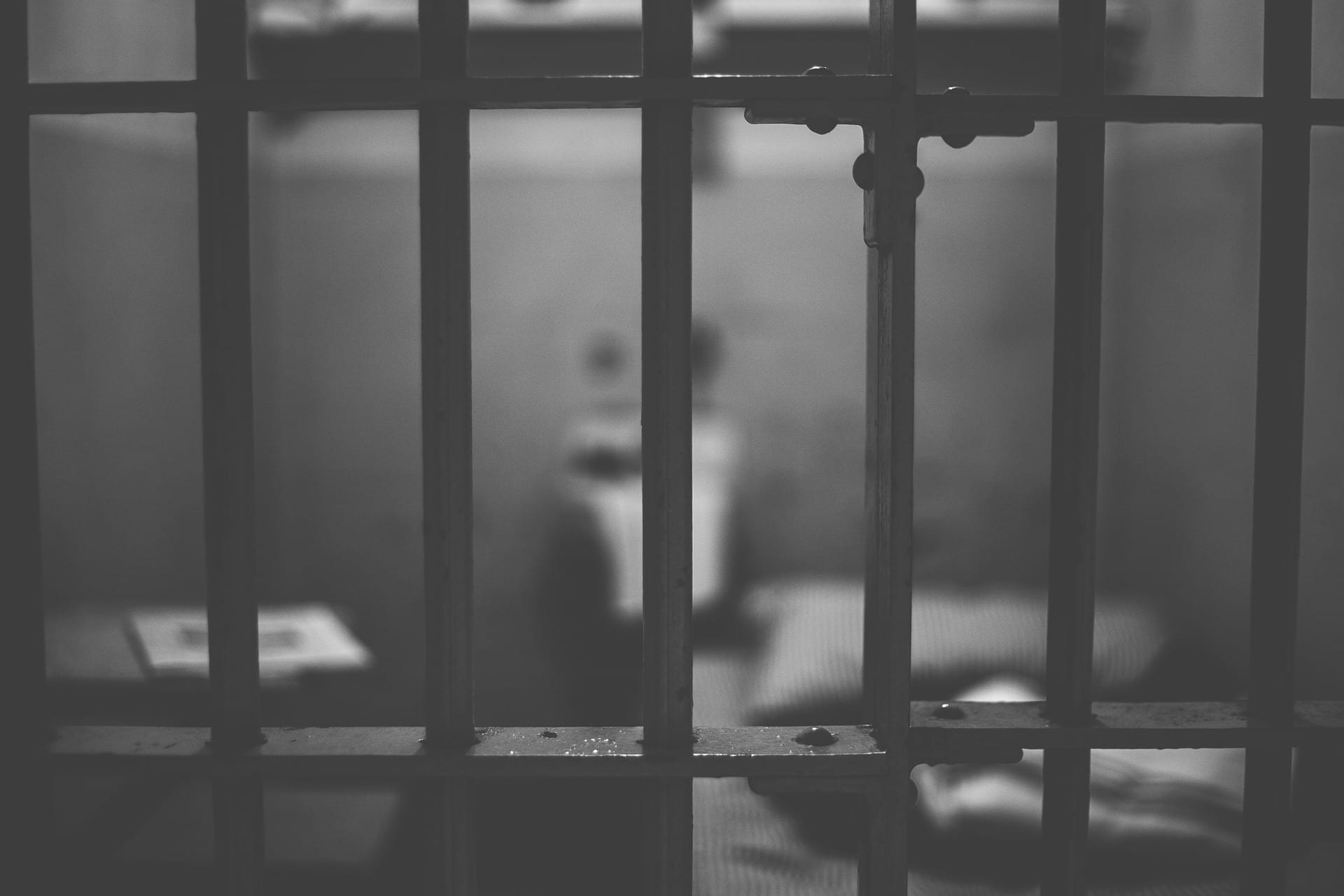 Prison cell; photo by AlexVan, via Pixabay, CC0.
