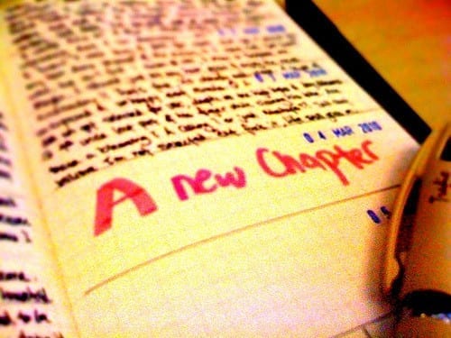 Journal with the words "New Chapter" in red; image by Jason See, via Flickr, CC BY-ND 2.0, no changes made.