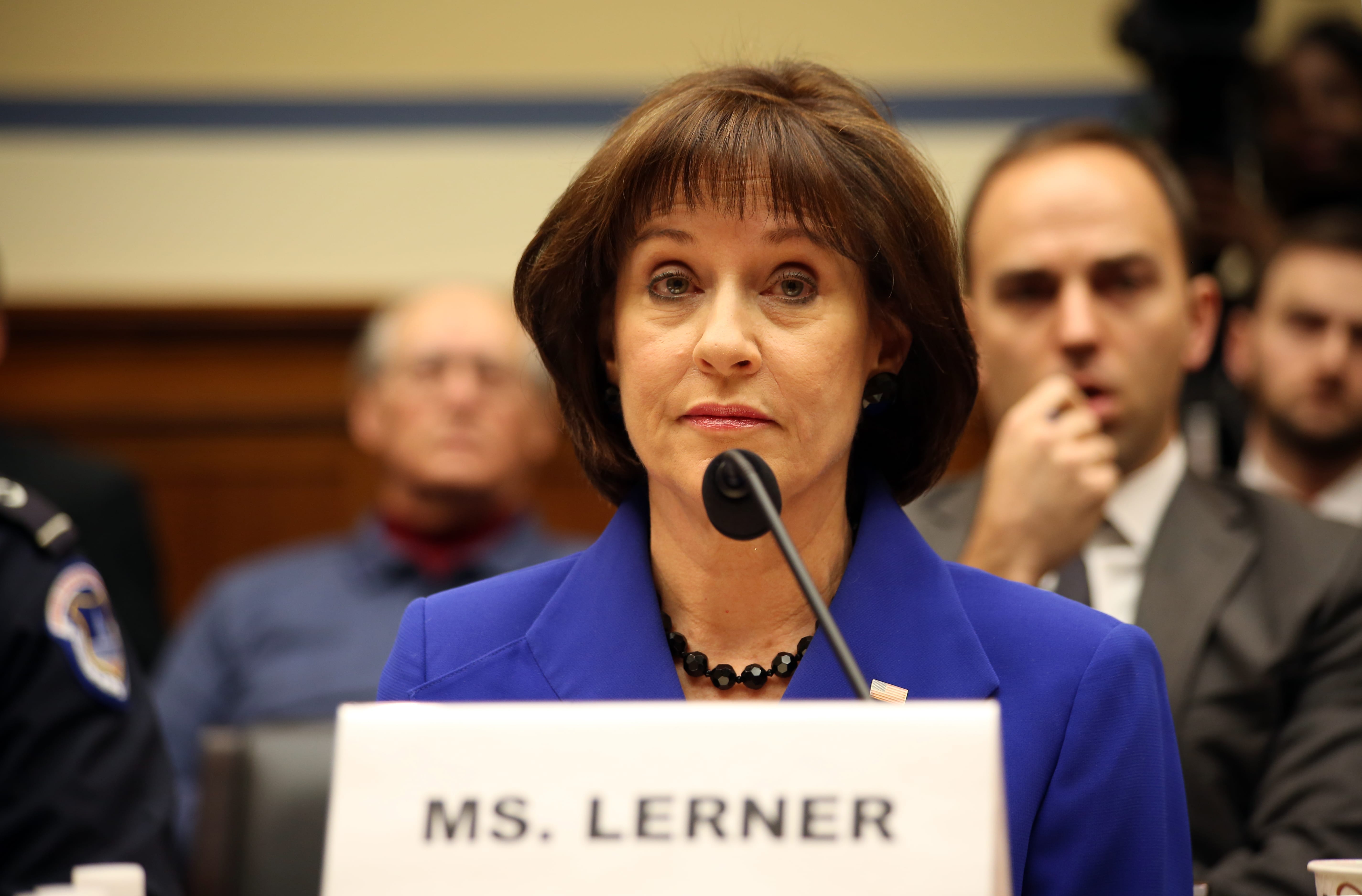 Lois Lerner takes part in a House oversight committee meeting.