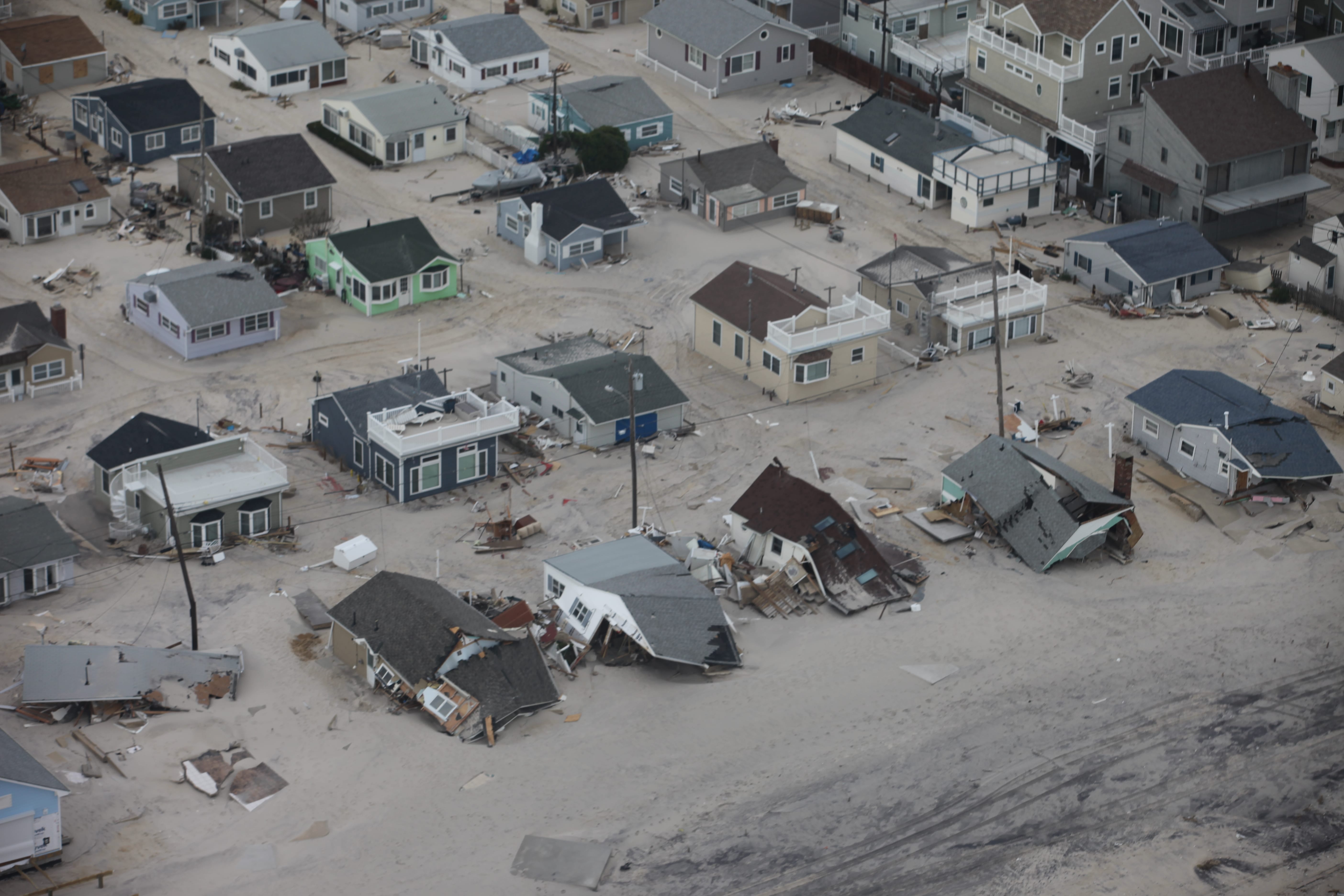 Houses on the Jersey Shore showing extensive damage from Hurricane Sandy.