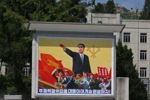 An example of a North Korean propaganda (not the one allegedly stolen by Otto Warmbier); image by Roman Harak, CC BY-SA 2.0, via Wikimedia Commons, no changes.