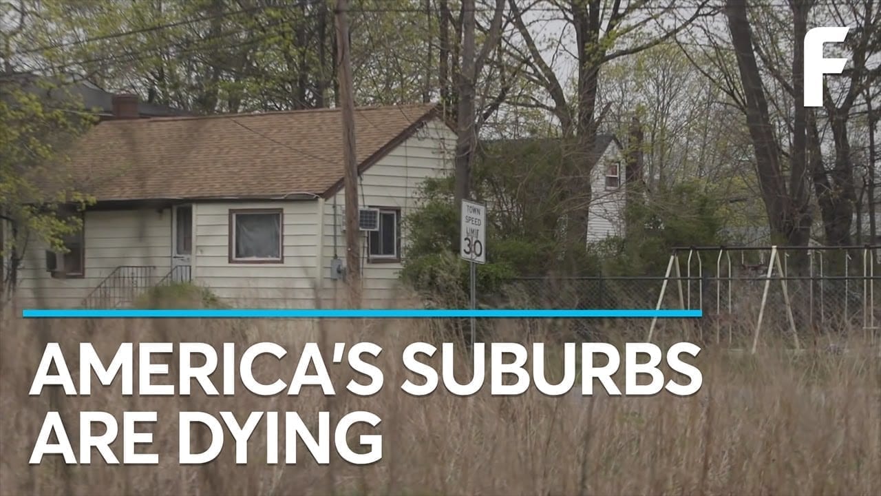 A single family home, overgrown with weeds, exemplifies suburban decline in America.