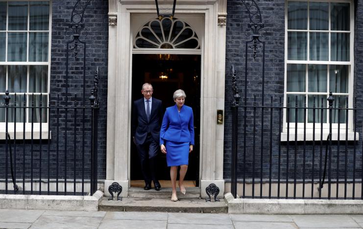 Theresa May walking out of 10 Downing Street