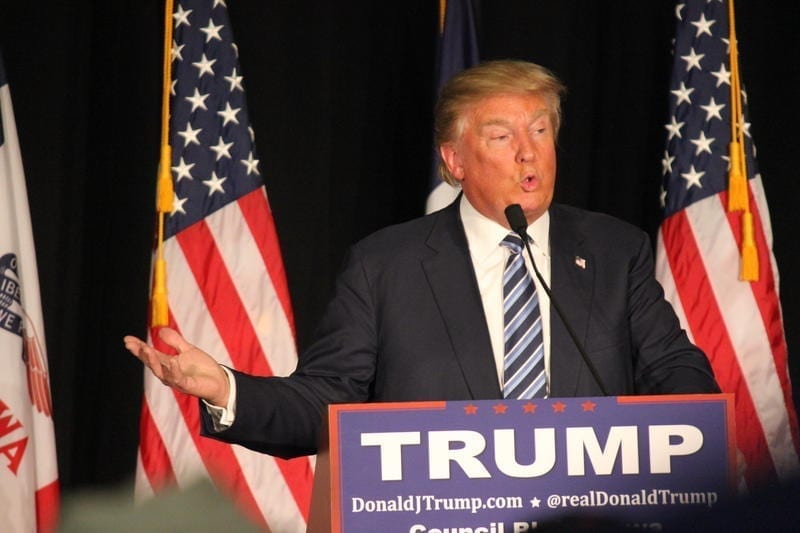Candidate Trump speaking at a campaign rally.