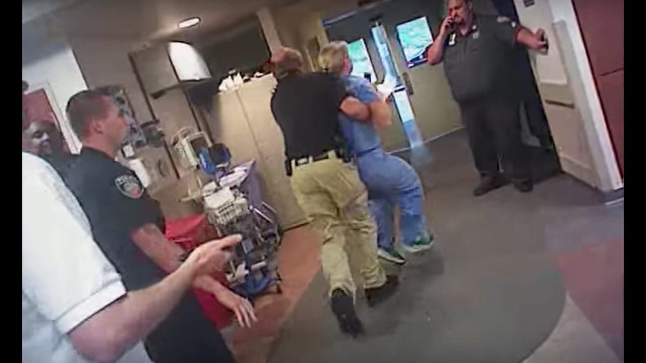 Image of Detective Payne Arresting Nurse Alex Wubbels