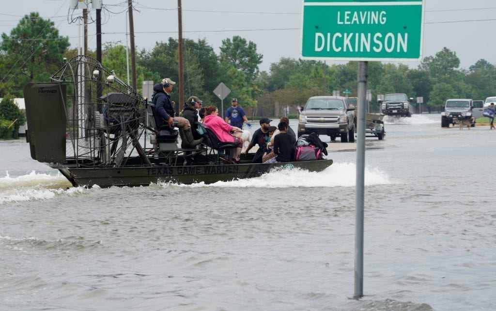 People are rescued by airboat as they evacuate from flood waters from Hurricane Harvey in Dickinson, Texas August 27, 2017. (Photo: Rick Wilking/REUTERS)