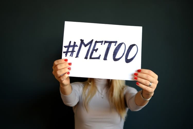 Image of a Girl Holding Up a #MeToo Sign