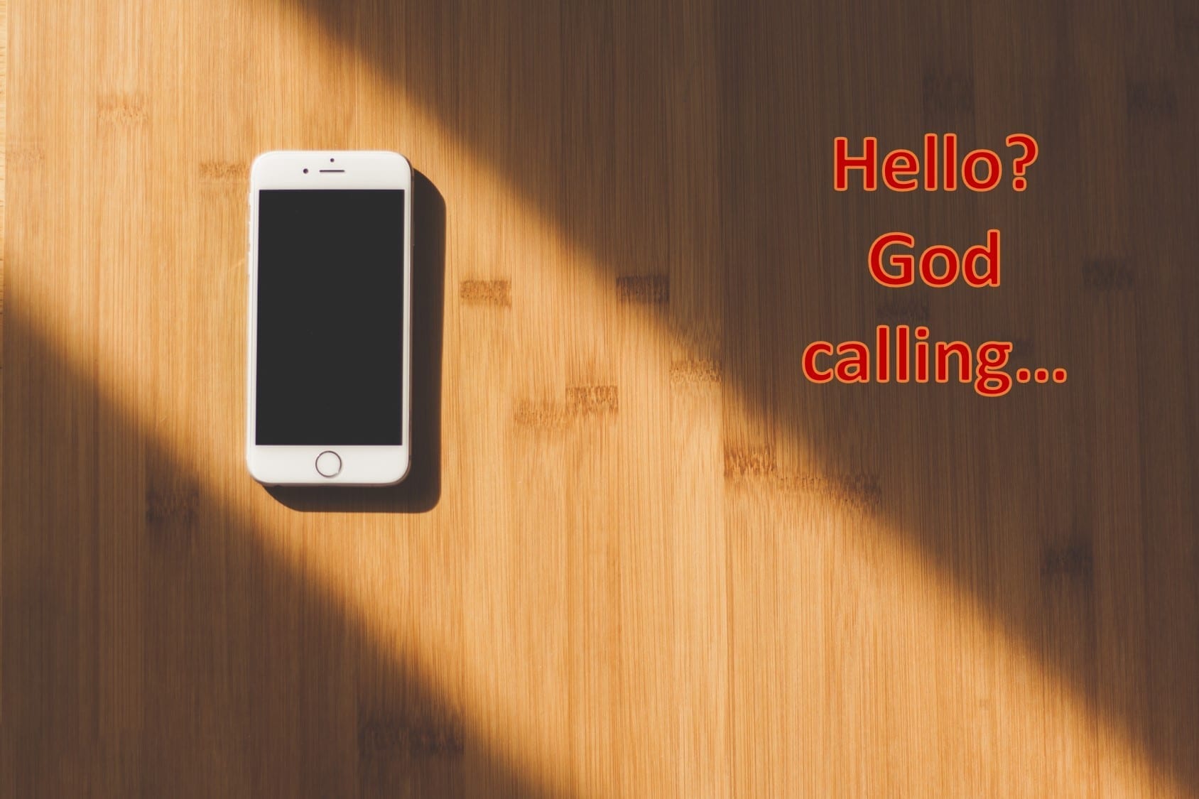 Cellephone on table, text saying "Hello? God calling..."; image via Negative Space on www.pexels.com by CC0; text added by author.