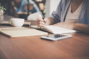 Woman doing research; image courtesy Tirachard Kumtanom, via Pexels.com, CC0.