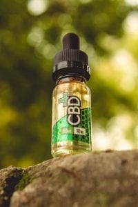 CBD E-Liquid, Tinctures; image courtesy of Vaping360.com/cbd-oil-cannabidiol-hemp-oil, via Flickr, CC BY-ND 2.0, no changes made.