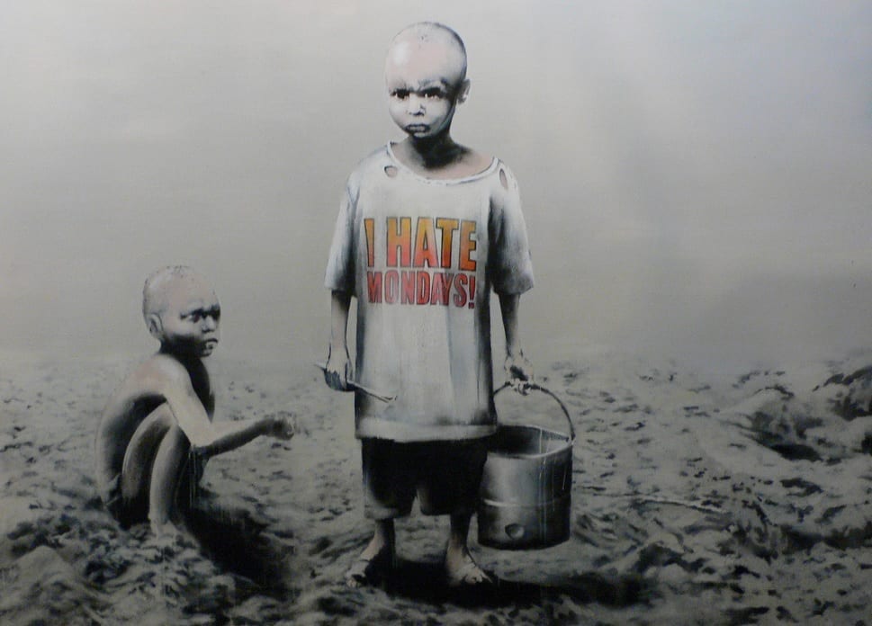 Graffiti art of impoverished-appearing boys. One carries a bucket and wears an I Hate Mondays t-shirt as the other squats nearby.