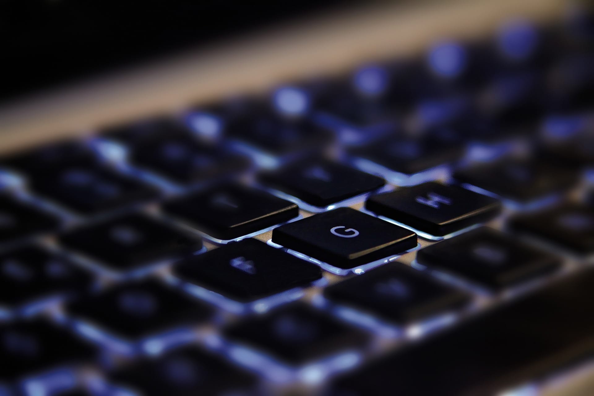 Computer keyboard with backlit keys; image by Pixies, via Pixabay, CC0.