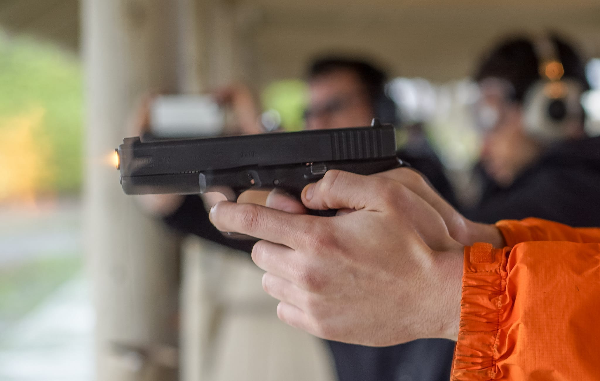 Man firing handgun; image by Peretz Partensky, via Flickr, CC BY-SA 2.0, no changes.
