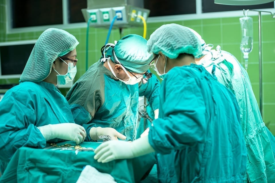 Image of doctors performing a surgery