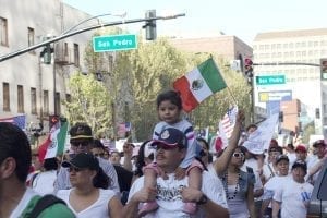 Image of Mexican immigrants marching for more rights in San Jose