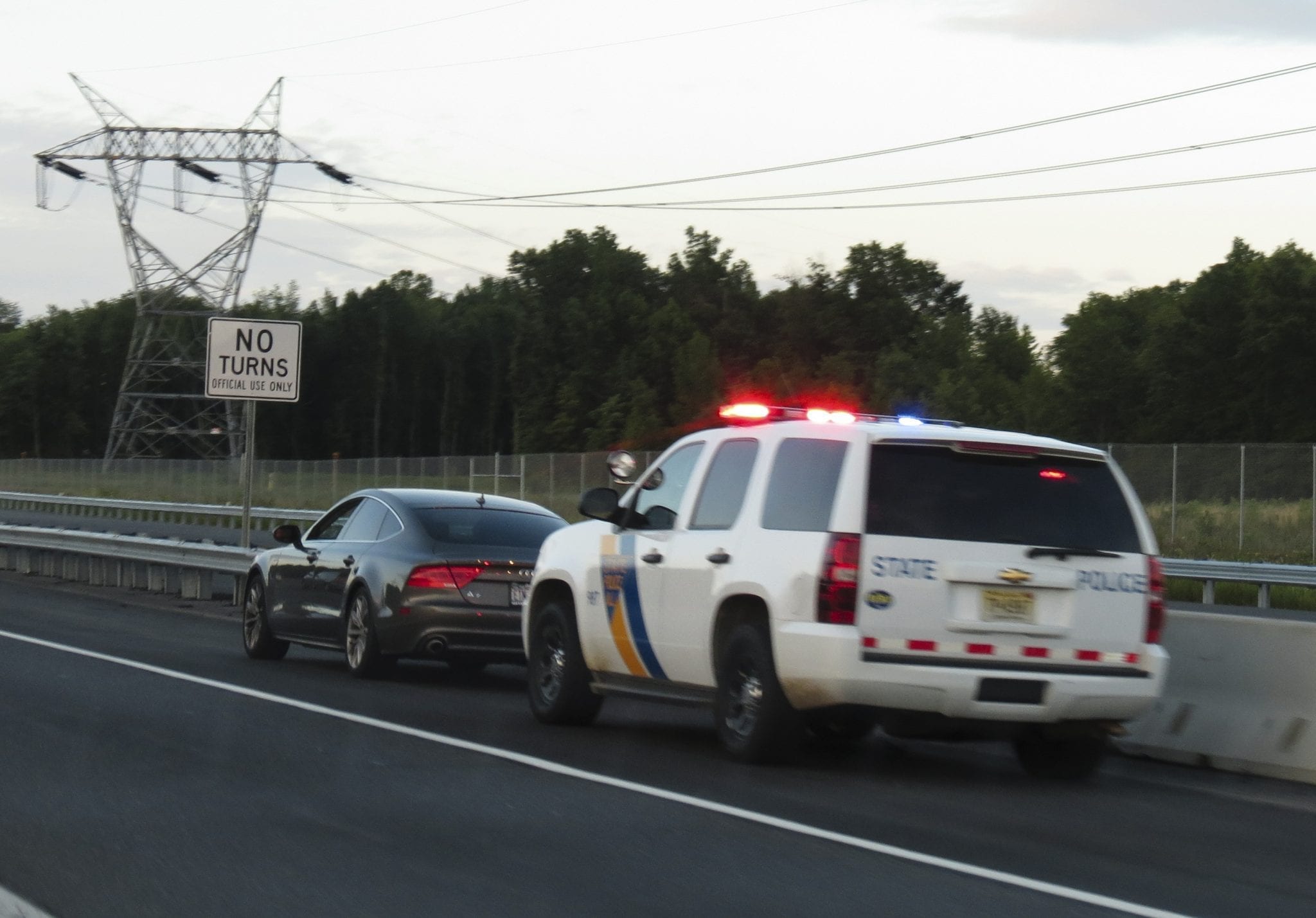 Traffic stop; image by versageek, CC BY-SA 2.0, no changes, via Wikimedia Commons.