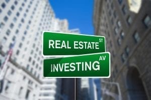 Real estate investing street sign on Wall Street; image by Investment Zen via Flickr, CC BY 2.0, no changes.