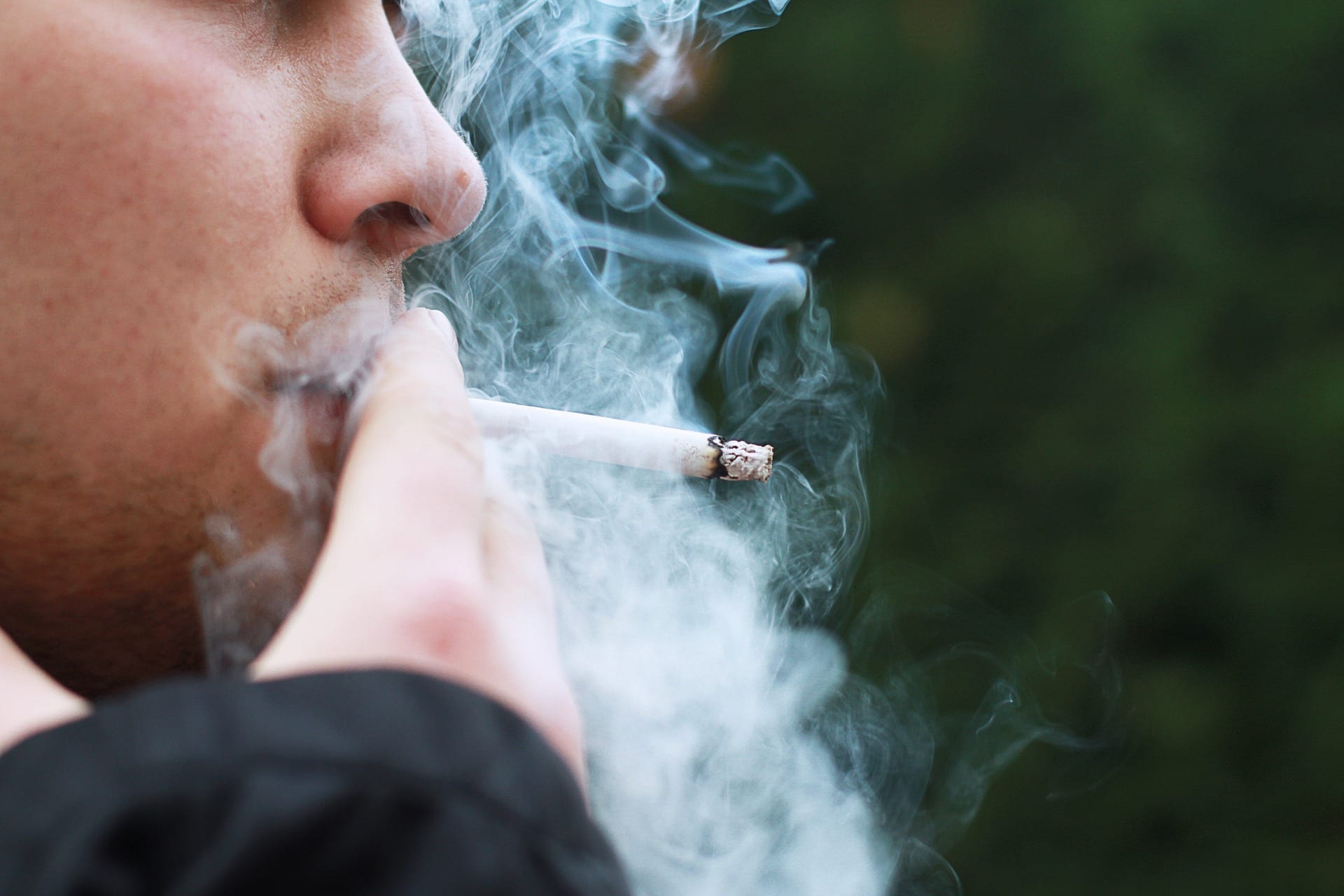 Man smoking; image by Kruscha, via Pixabay, CC0.