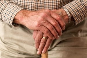 Elderly man with walking stick; image by stevepb, via Pixabay, CC0.