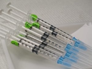 Syringes prepped for use; image by Nathan Forget, via Flickr, CC BY 2.0, no changes.
