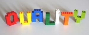 "Quality" spelled in Lego-style blocks; image via PxHere.com, CC0.