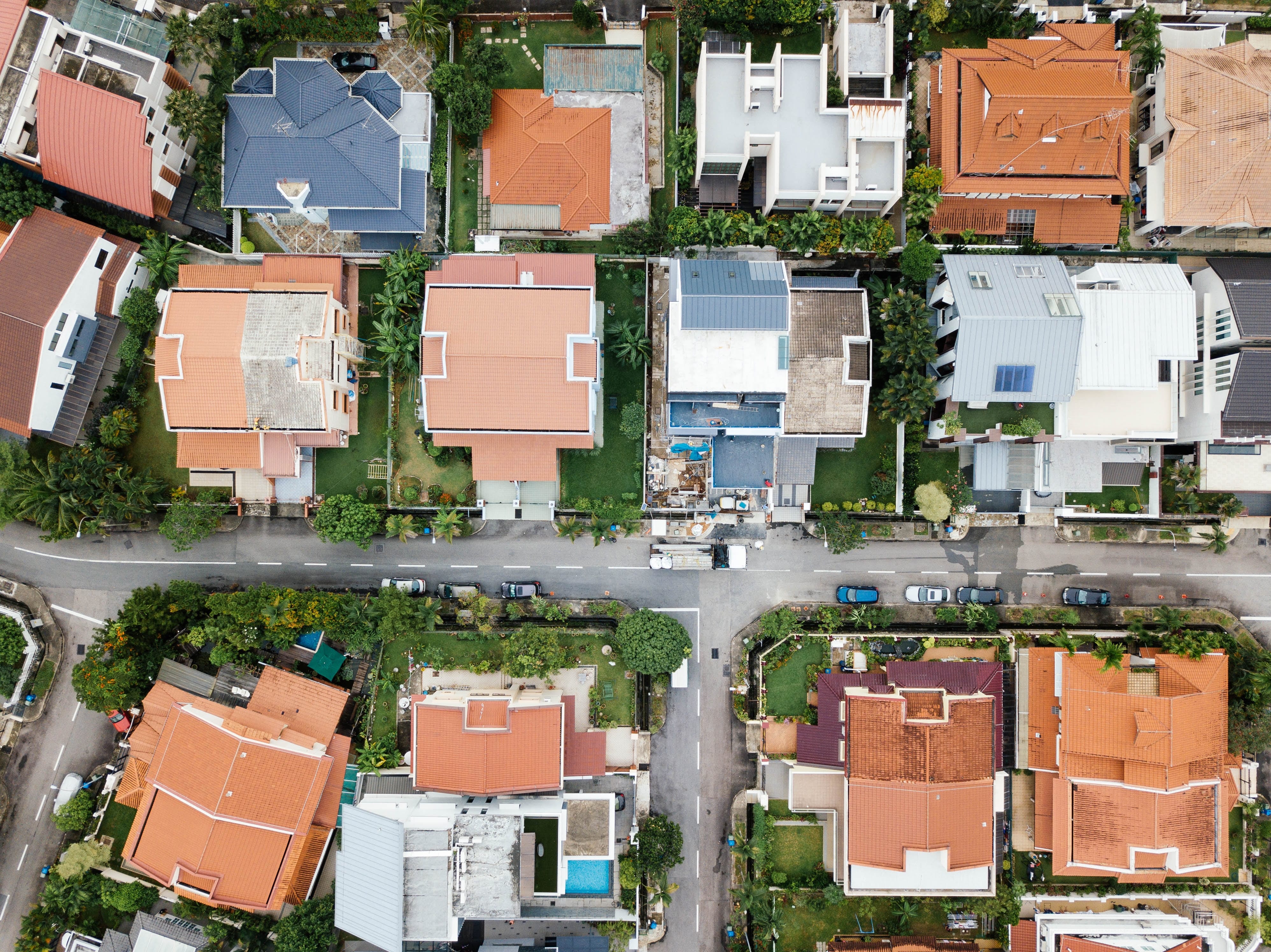 Aerial view of a neighborhood; image by chuttersnap, via Unsplash.com.