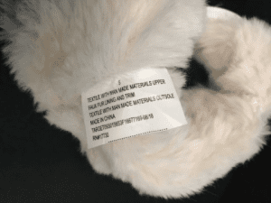 Recalled Cat & Jack 'Chiara' Boots inside tag with item number