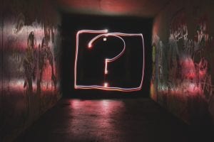 Neon question mark sign; image by Emily Morter, via Unsplash.com.