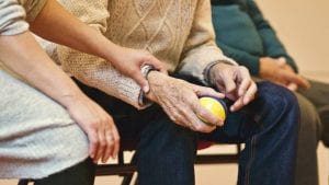 Elderly man and woman sitting