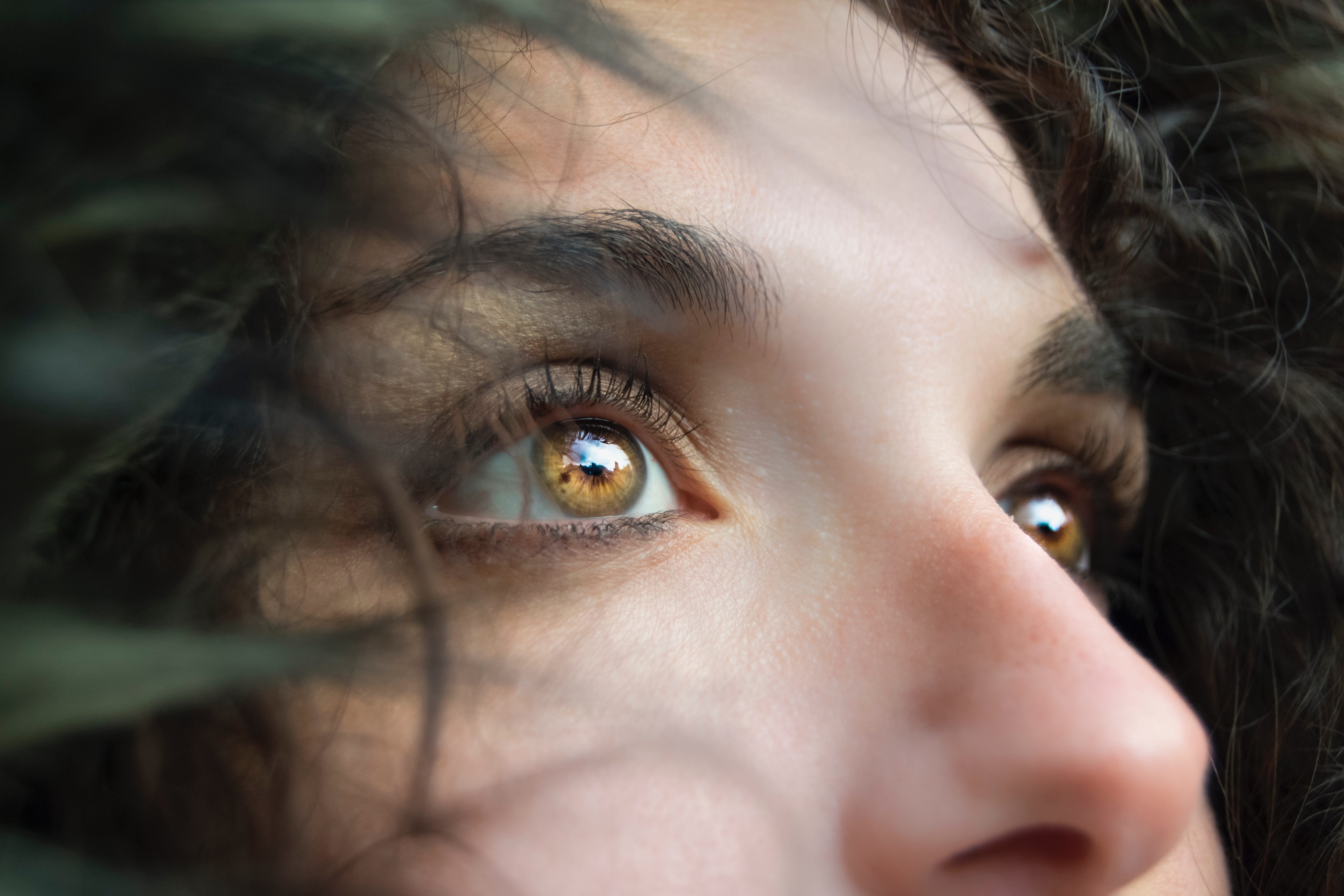Woman’s face, highlighting nose and eyes; image by Marina Vitale, via Unsplash.com.