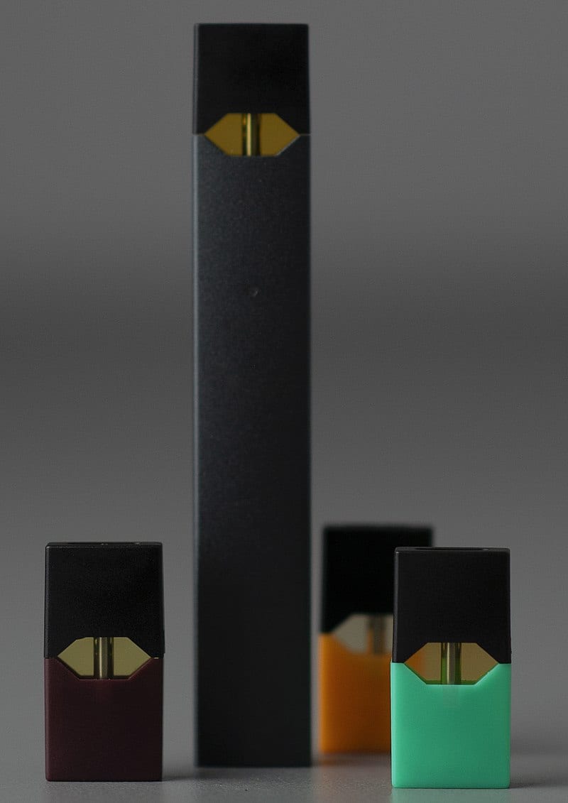 A Juul electronic cigarette, with four 'pods'