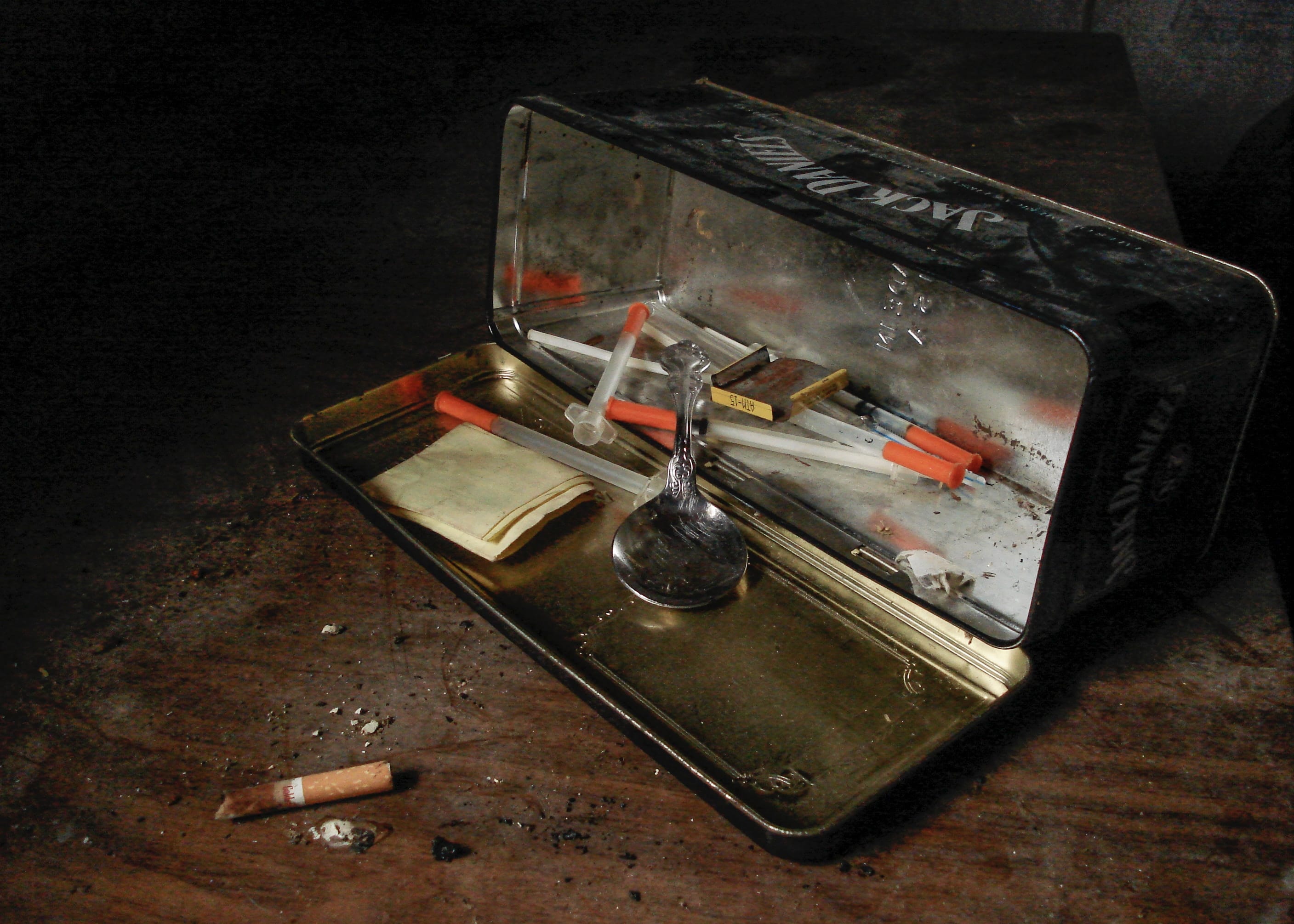 Syringes and spoon in metal storage box; image by Matthew T. Rader, via Unsplash.com.