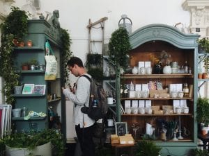 Man browsing in shop; image by Ellen Auer, via Unsplash.com.