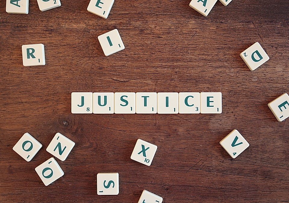 Letters spelling 'Justice'