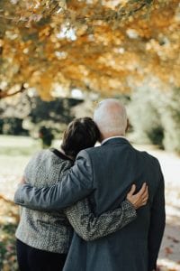 Man and woman holding each other; image by Ryan Crotty, via Unsplash.com.