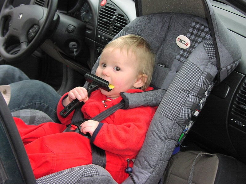 Child sitting in a car seat