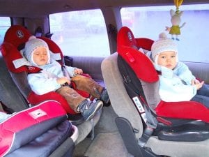 Children sitting in car seats