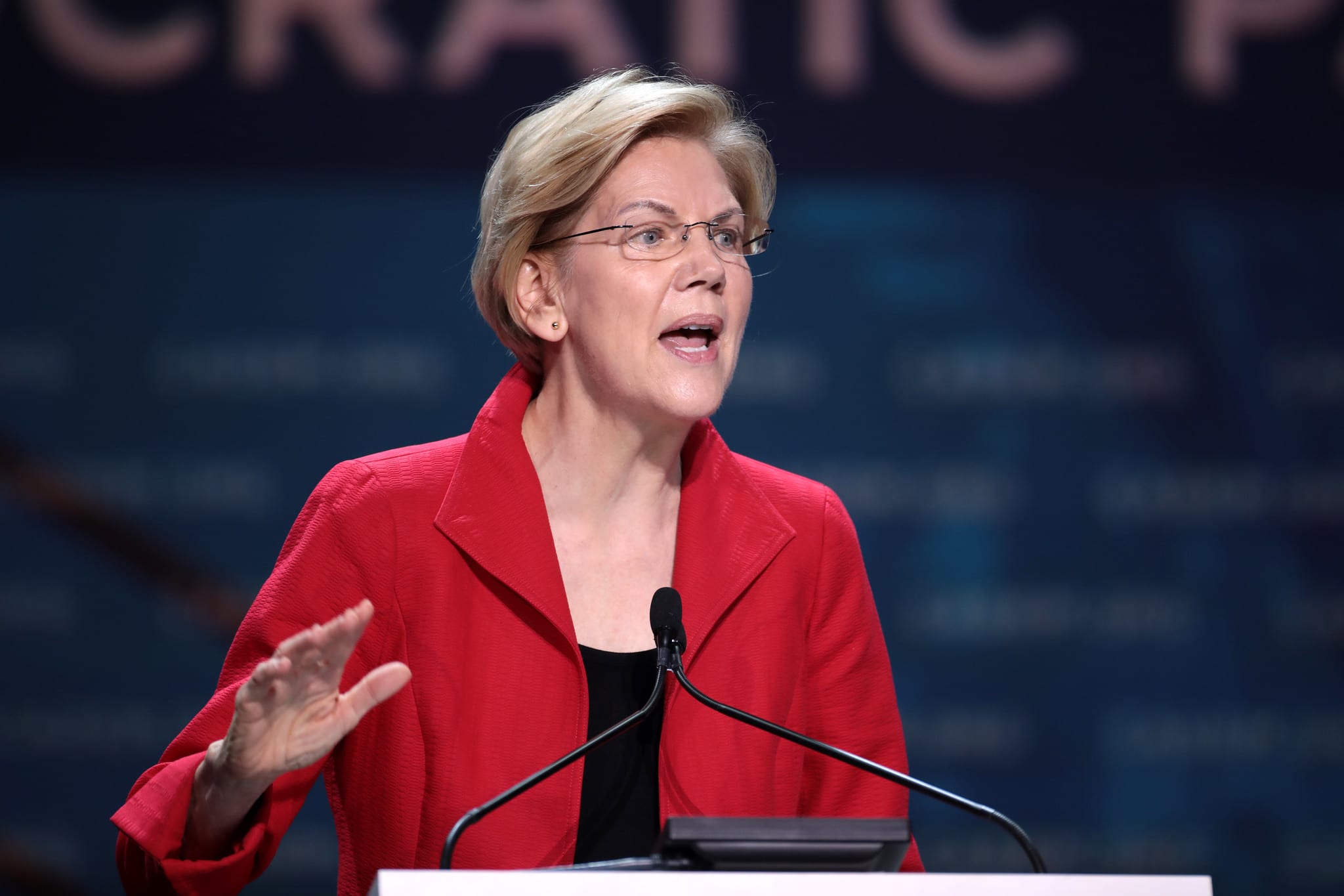 U.S. Senator Elizabeth Warren speaking with attendees at the 2019 California Democratic Party State Convention at the George R. Moscone Convention Center in San Francisco, California. Image by Gage Skidmore, via Flickr, CC BY-SA 2.0, no changes.