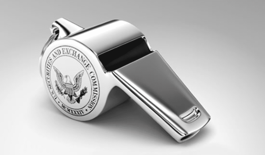 A silver whistle with “Securities and Exchange Commission” printed on one side; image via U.S. SEC Office of the Whistleblower, public domain.