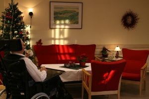 Elderly Man Sitting in a Nursing Home