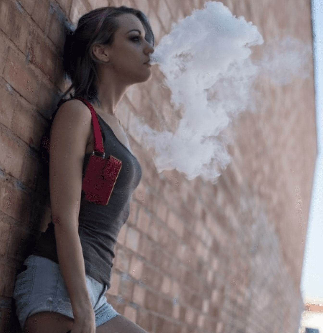 Young woman vaping; image by Lexphumirat, via Pixabay.com.