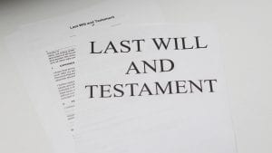 White paper with “Last Will & Testament” printed on it; image by Melinda Gimpel, via Unsplash.com.