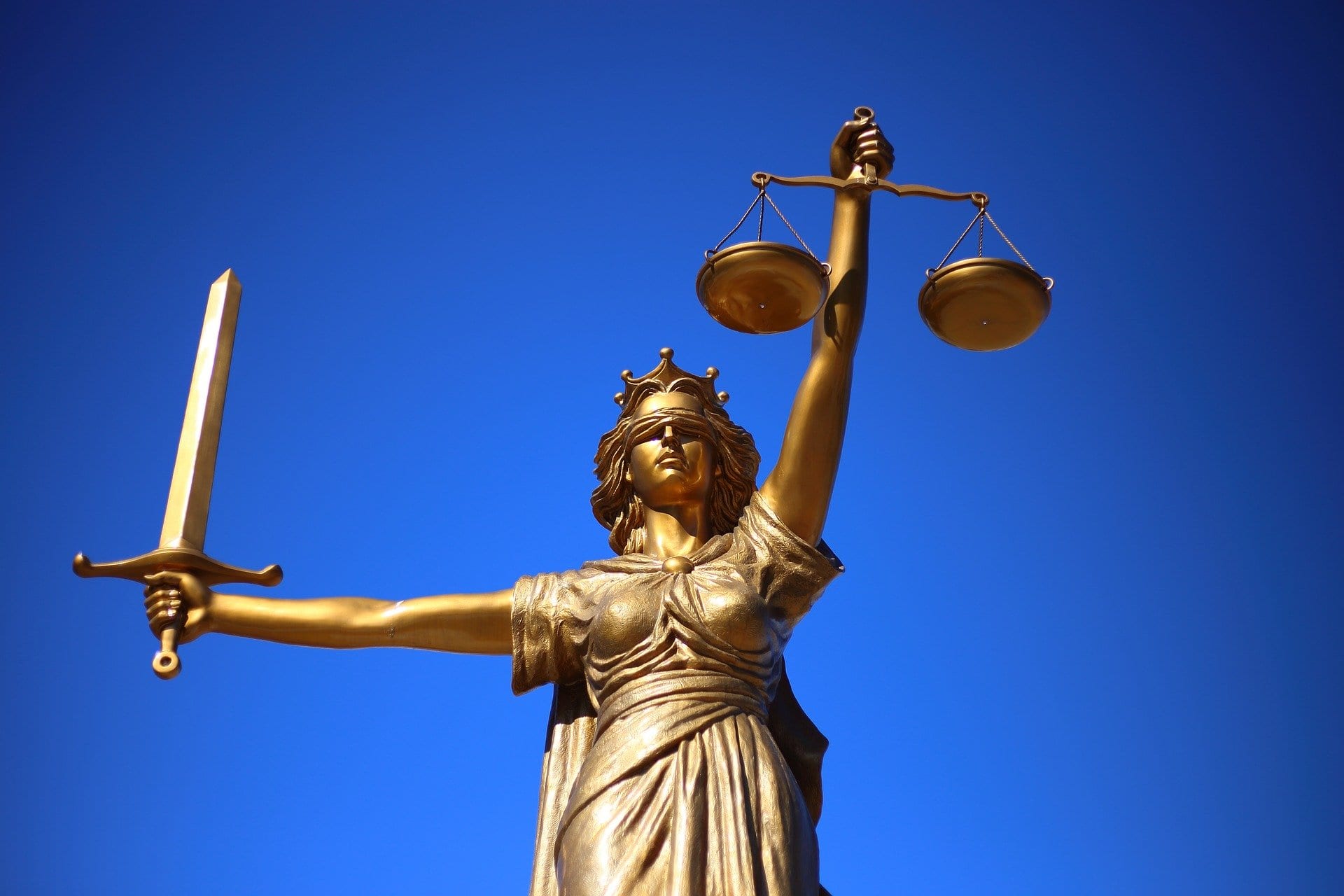 Statue of Lady Justice; image by William Cho, via Pixabay.com.