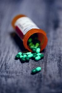 Shallow focus photography of prescription bottle with capsules; image by Sharon McCutcheon, via Unsplash.com.