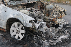 Side view of front end of vehicle after crash and fire; image by Jan2575, via Pixabay.com.