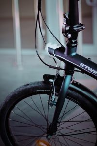 Black and gray bike; image by Cihan Soysakal, via Unsplash.com.