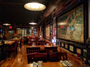 Empty pub; image by Connor Smith, via Unsplash.com.