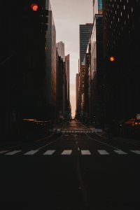 Empty city street; image by Alec Favale, via Unsplash.com.