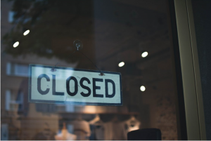 Closed sign in shop window; image by fotografierende, via Pexels.com.