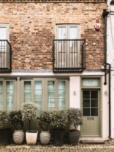 Six green leafed plants near brown concrete two-story house at daytime; image by Fineas Anton, via Unsplash.com.